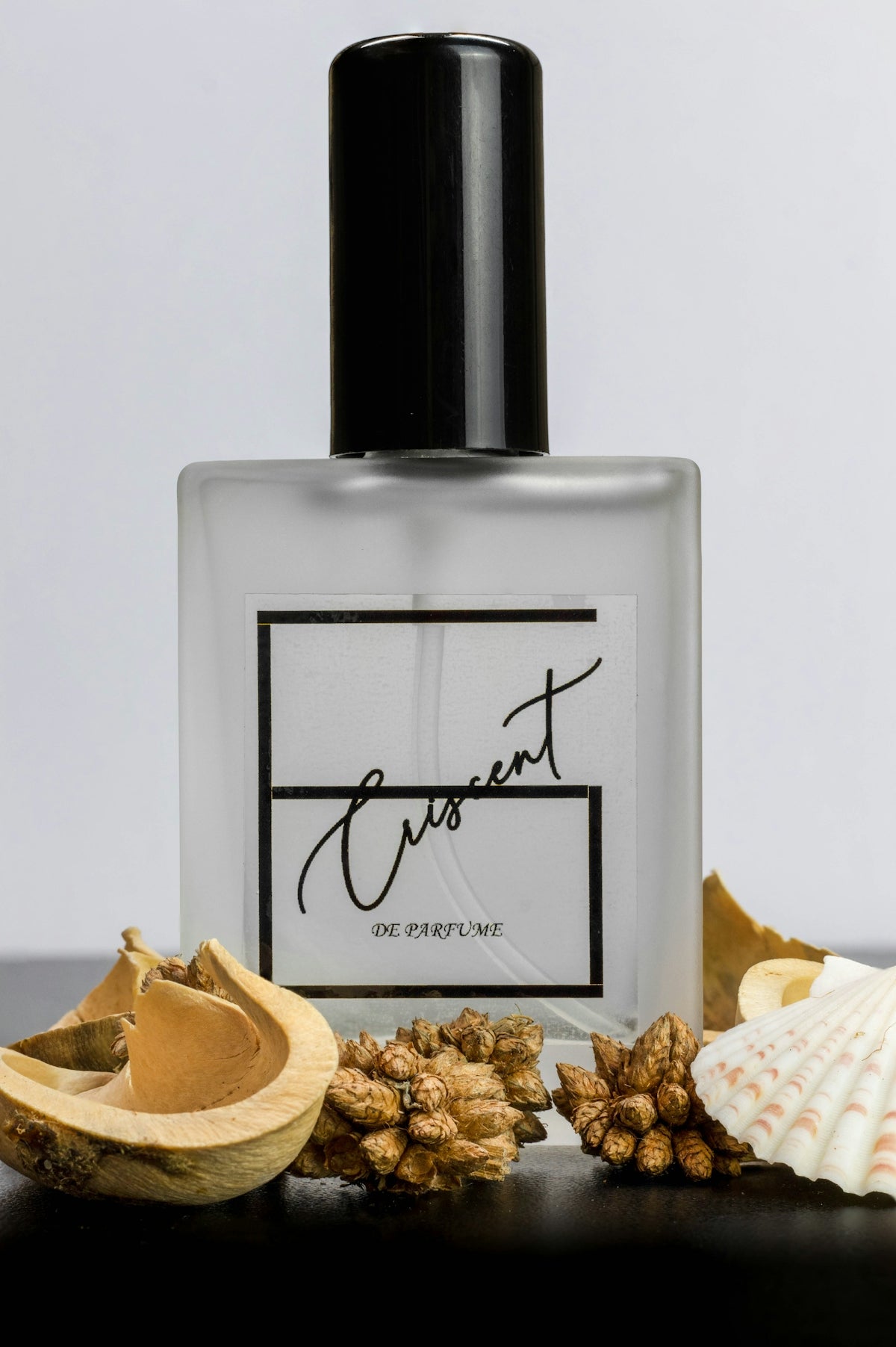 a bottle of perfume sitting on top of a table